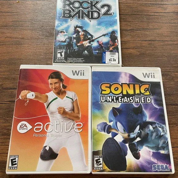 White Video Games for Wii Featuring Rock Band 2 EA Sports Active Sonic Unleashed - Picture 1 of 1